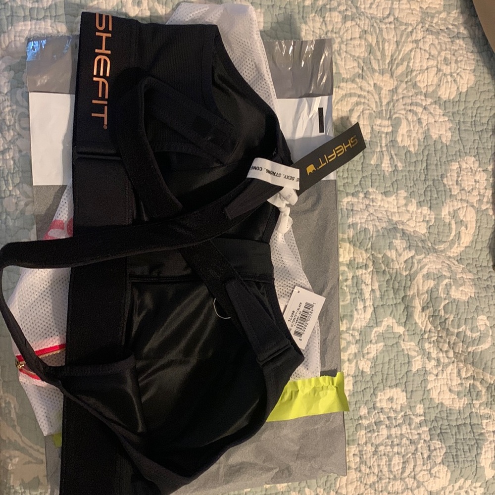 SHEFIT The Ultimate sports bra size 1 Luxe new with tags in bag.